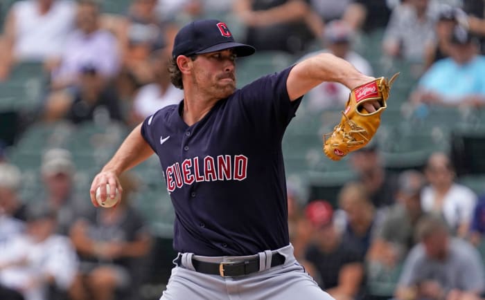 Caption: Jul 24, 2022; Chicago, Illinois, USA; Cleveland Guardians starting pitcher Shane Bieber (57) throws the ball against the Chicago White Sox during the first inning at Guaranteed Rate Field. Mandatory Credit: David Banks-USA TODAY Sports